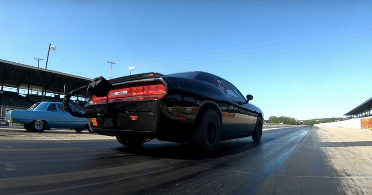 Take A Look Under The Hood Of This Smokin 1500 Hp Twin Turbo Dodge Challenger