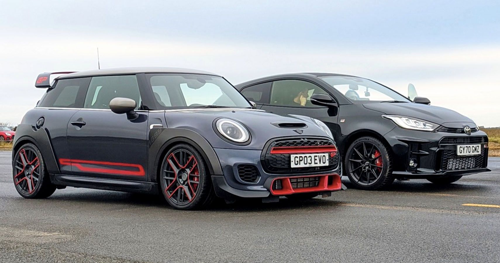 Watch The AWD Toyota GR Yaris Challenge A FWD Mini Cooper GP On A Wet Track
